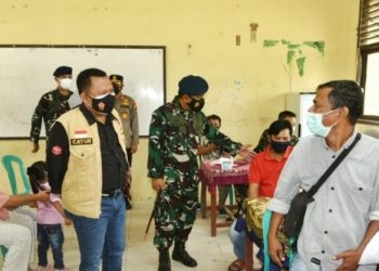Apresiasi Lanud Roesmin Nurjadin, Bupati Kampar Senang Warganya di Vaksin